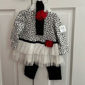 Baby leopard top and black pants and matching headband. New. Size 9 months.